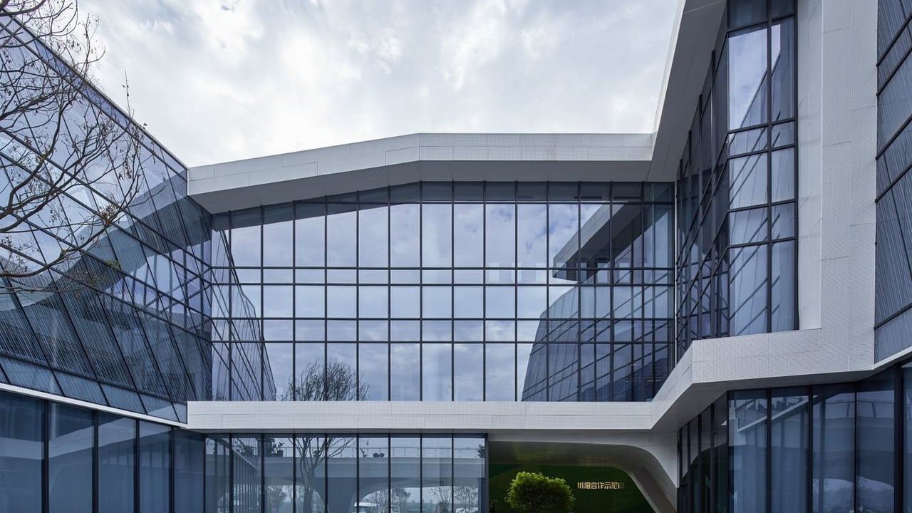 Contemporary building with glass facade in Sichuan, China showcasing modern architectural design.