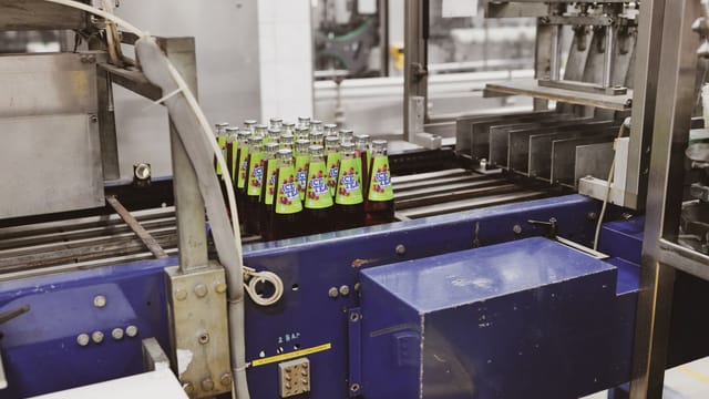Glass bottles on an automated line in a Lipik factory, Croatia.