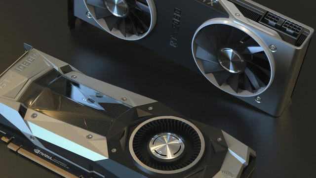 Top view of NVIDIA GTX 1080 and RTX 2080 graphics cards used in advanced computer setups.