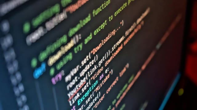 Vivid close-up of code on a computer screen showcasing programming details.