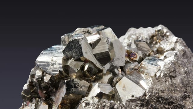 Close-up image of sparkling pyrite crystals showcasing their metallic luster.