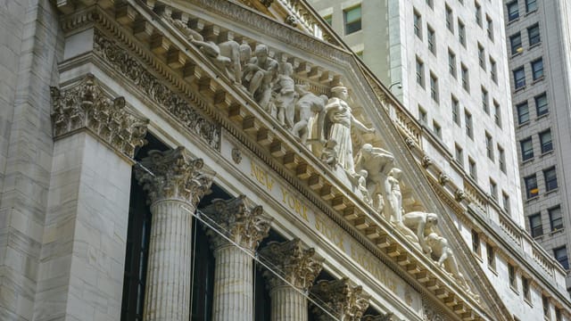 Classic architecture of the New York Stock Exchange facade in NYC.