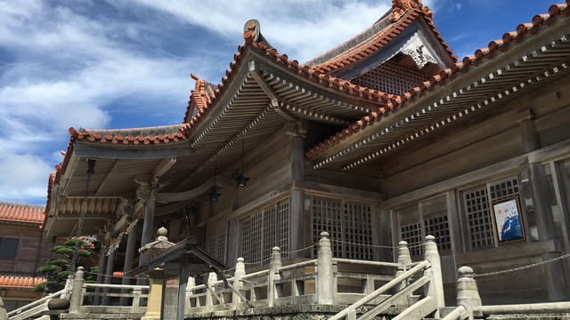 Explore a stunning Shinto shrine with intricate architecture in Ginowan, Okinawa.