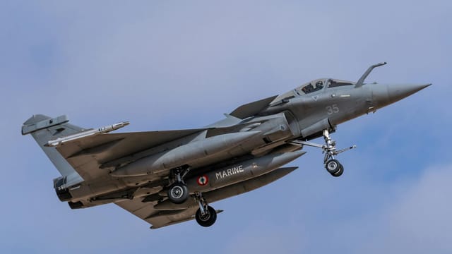 Dassault Rafale fighter jet flying at Los Llanos, showcasing its naval aviation capabilities.