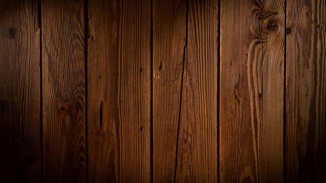 High-quality rustic wooden plank background showcasing natural wood grain texture, ideal for design and decor projects.