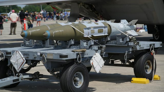 Close-up of military aircraft weapons on display at an airshow in Hampton, Virginia.