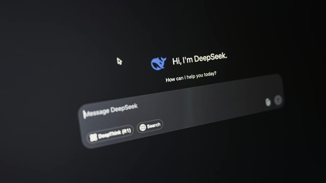 Close-up of DeepSeek AI interface on a dark screen highlighting chat functionality.
