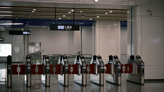 Turnstiles at a metro entrance, Guangzhou Subway Line 10.