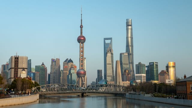 Illustrative image: Stunning skyline of Shanghai featuring the Oriental Pearl Tower and modern skyscrapers.