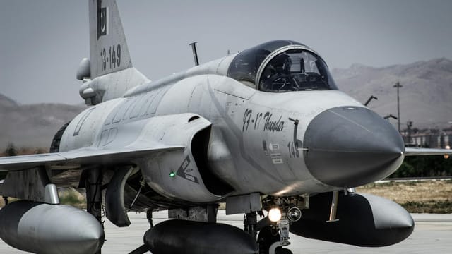 Detailed view of military jet on the runway in Konya, Türkiye, showcasing advanced aviation.