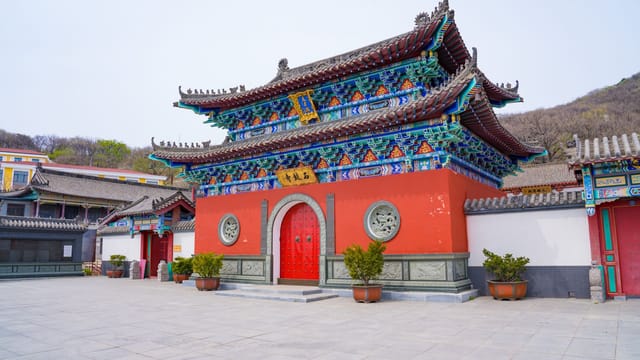 Beautiful traditional Chinese temple architecture in Dalian, Liaoning Province, China during spring.