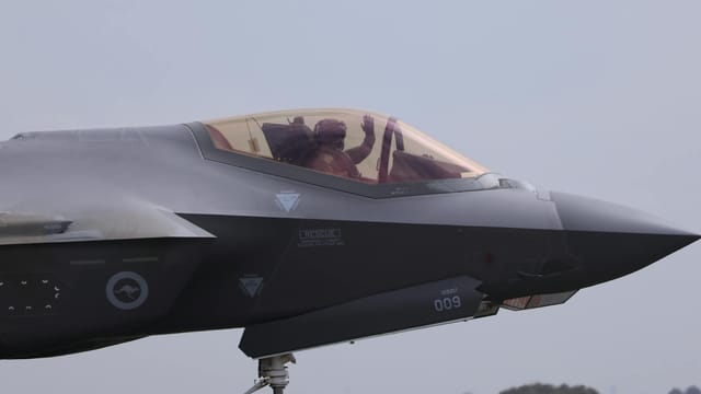 Close-up of an F-35 fighter jet with a pilot waving, captured at Geelong, VIC.