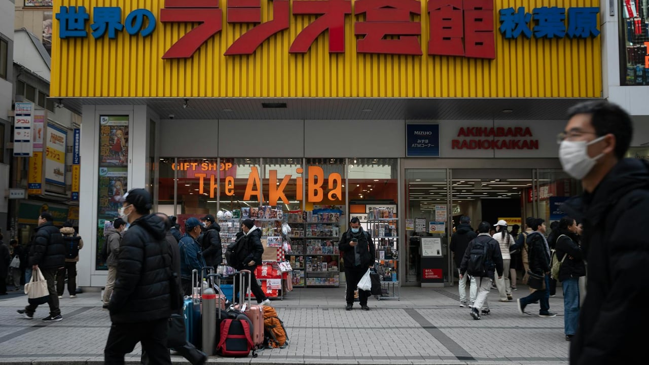 People shopping outside Akihabara Radio Kaikan in Tokyo, Japan.