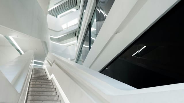 Explore this sleek modern interior with a futuristic design in Kowloon, Hong Kong.