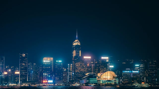 A captivating view of Hong Kong's skyline illuminated against the night sky.