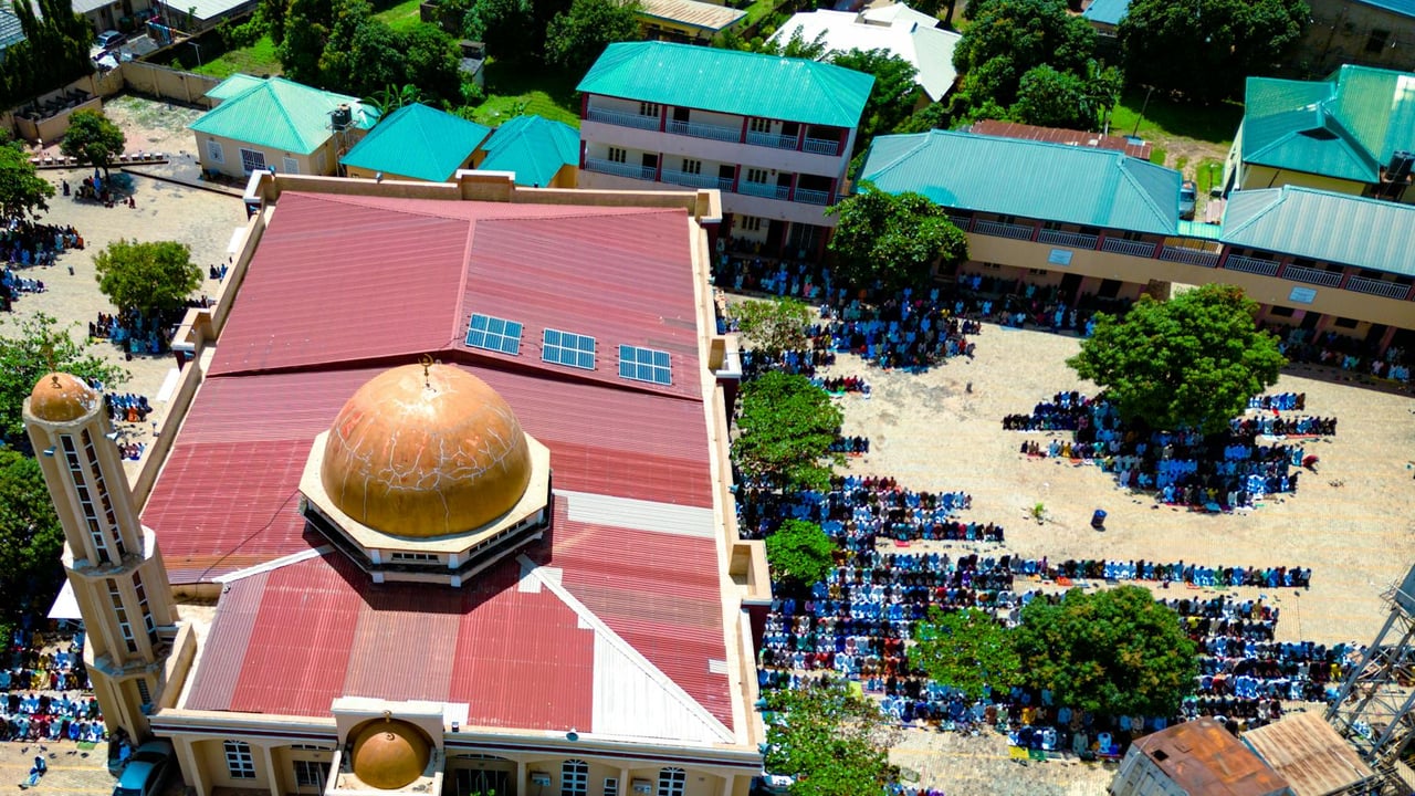 Aerial view of a mosque and congregation during prayer in Kaduna, Nigeria.
