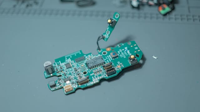 Detailed close-up of a circuit board showcasing intricate electronic components and wiring.