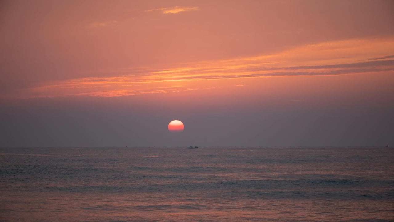 Peaceful ocean sunrise at Yangyang beach, capturing the calm and beauty of early morning.