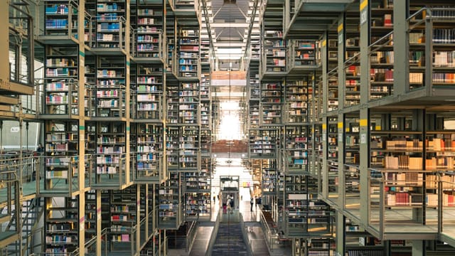 Expansive multi-level library in Mexico City showcasing modern architecture and vast book collections.