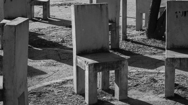 Abstract concrete chairs in Córdoba, Argentina create a striking urban scene.