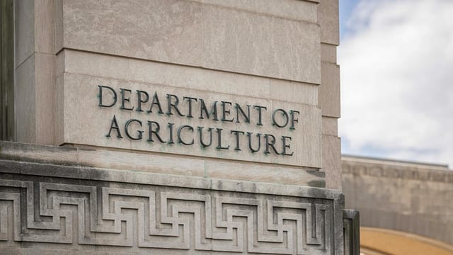 Close-up of the Department of Agriculture building facade with architectural details.