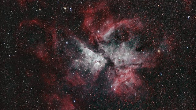 A captivating image of the Carina Nebula with rich colors and starry expanse.