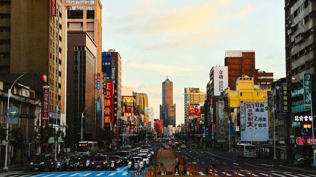 Explore the bustling streets of Kaohsiung, Taiwan, captured in stunning evening light.