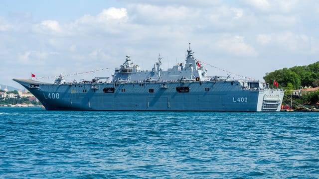 The TCG Anadolu L400 military ship navigating the waters of Istanbul, Turkey.