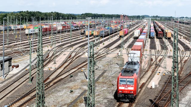 Expansive view of cargo trains at Hamburg's bustling rail terminal.