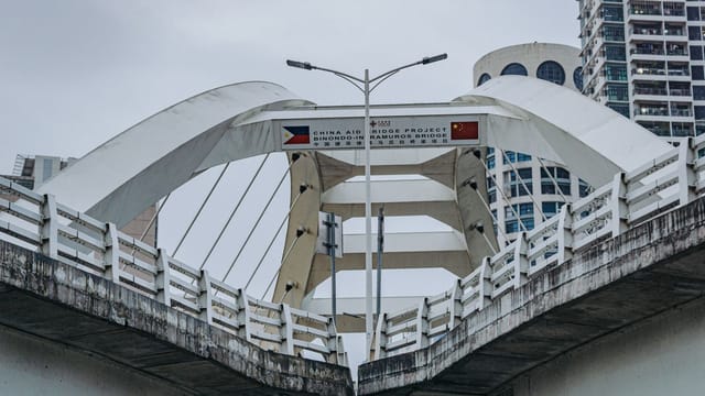 A modern bridge in Manila, Philippines, showcasing architectural beauty and urban development.