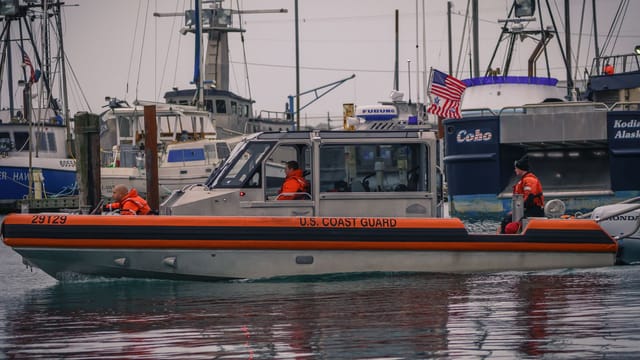 US Coast Guard vessel patrolling Coos Bay harbor, Oregon with crew on board.
