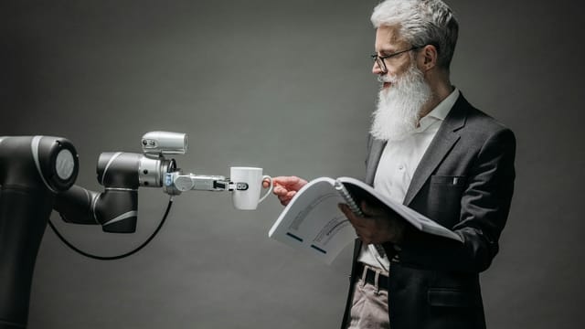 A scientist interacts with a robot helper, demonstrating modern technological innovation.