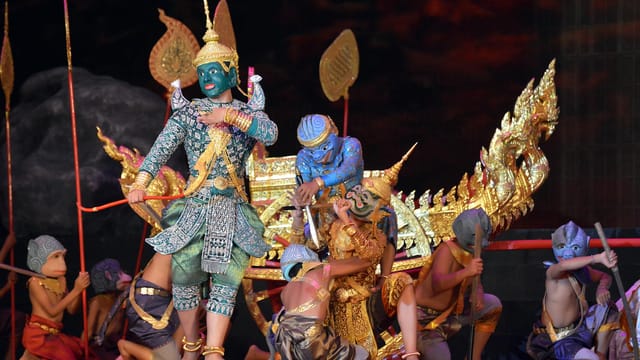 Colorful Khmer dance performance featuring traditional costumes and masks in Phnom Penh.