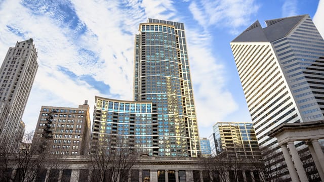 A captivating view of the Chicago skyline showcasing modern skyscrapers against a vivid blue sky.