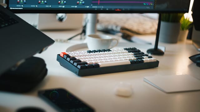 A professional digital workspace featuring studio equipment for video editing.