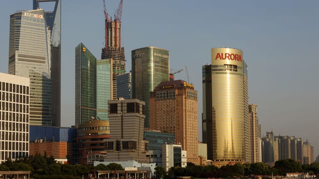 Stunning view of Shanghai's modern skyline featuring iconic skyscrapers and riverfront.
