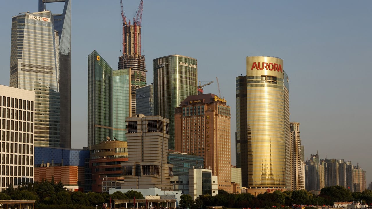Stunning view of Shanghai's modern skyline featuring iconic skyscrapers and riverfront.
