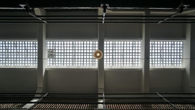 A focused view of the ceiling grates inside Alcatraz Prison, San Francisco.
