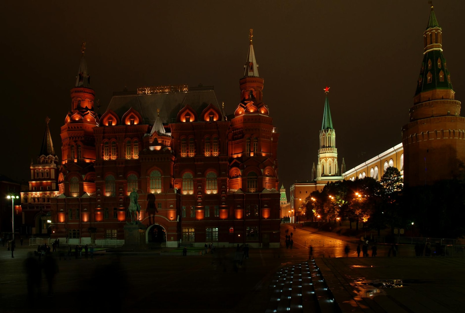 Night view of the illuminated Red Square and State Historical Museum in Moscow, Russia.