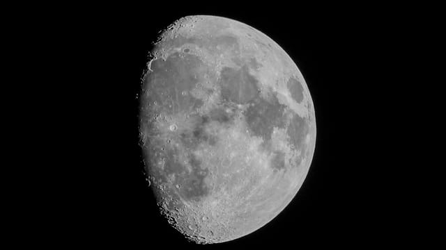 Detailed close-up of the waxing gibbous moon against a black sky, captured in Darien, CT.
