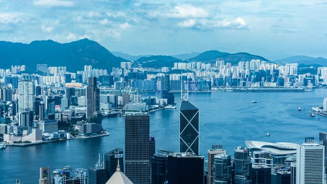 Explore the majestic Hong Kong skyline with its iconic skyscrapers and vibrant harbor.