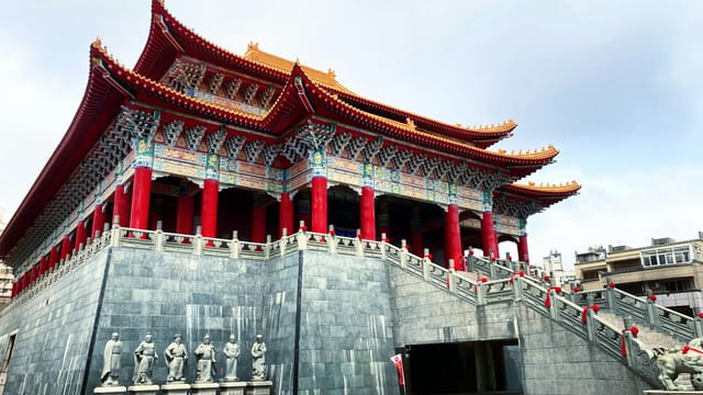 A majestic traditional Chinese temple with intricate architecture and vibrant colors in Taiwan.