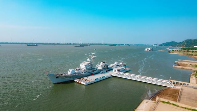 Aerial view of military ships docked at Jiujiang harbor, Jiangxi, China.
