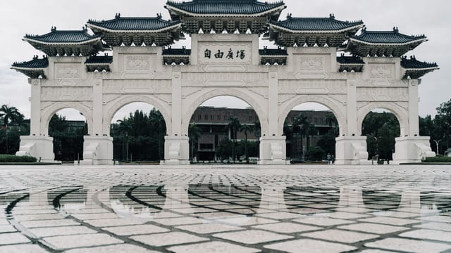 Majestic Liberty Square Archway in Taipei captured on a serene day reflecting its grand architecture.