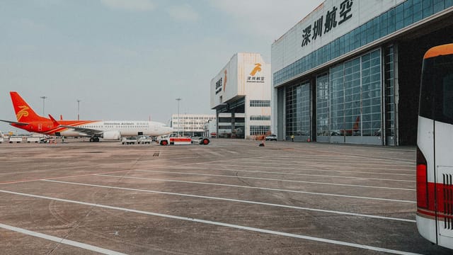 A Shenzhen Airlines plane parked on the tarmac at Shenzhen Airport.