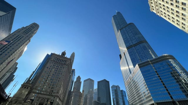 A striking view of Chicago's skyline featuring modern skyscrapers on a bright, sunny day.