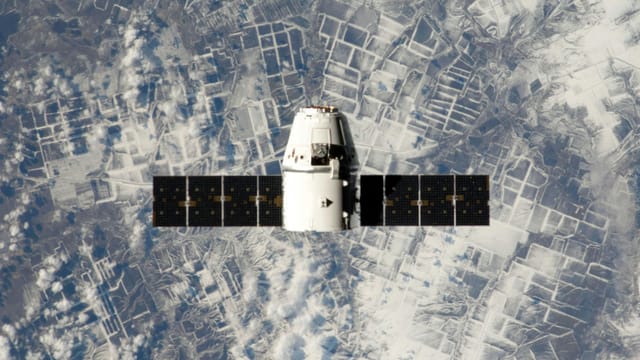 High-resolution image of a satellite orbiting Earth, showcasing space technology.