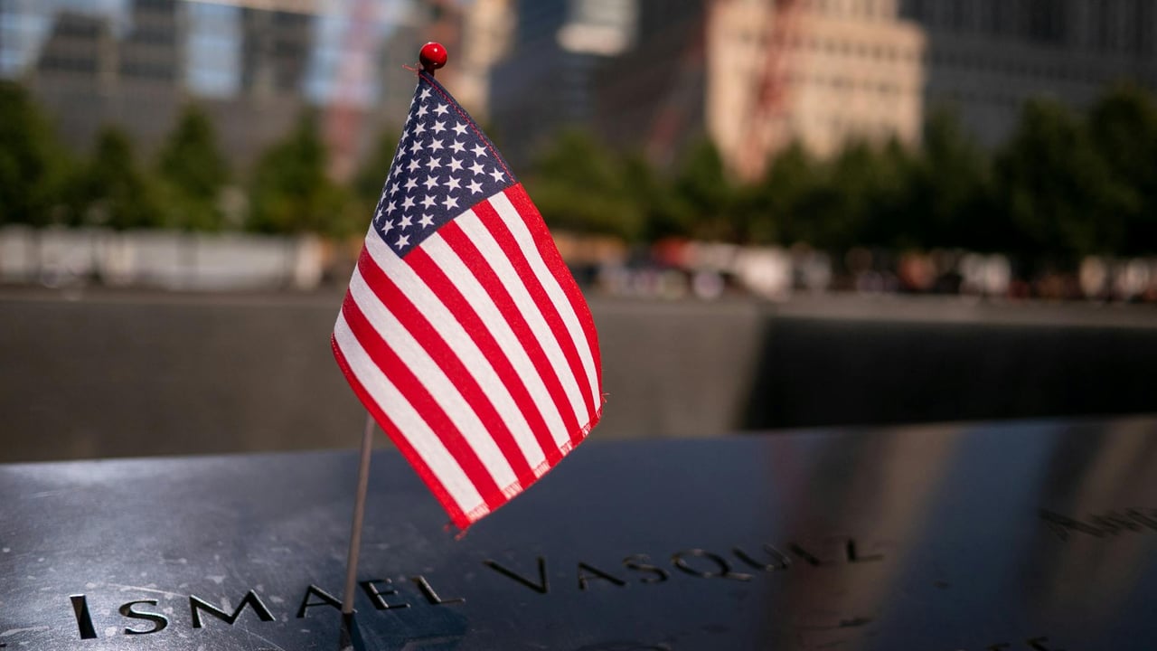 Close-up of a small American flag at the 9/11 Memorial in New York City.