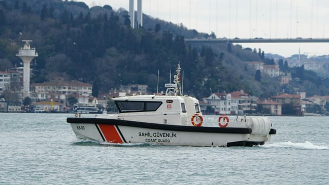 A Coast Guard patrol boat navigates the Bosphorus Strait in Istanbul, Turkey.