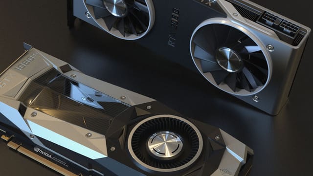 Top view of NVIDIA GTX 1080 and RTX 2080 graphics cards used in advanced computer setups.